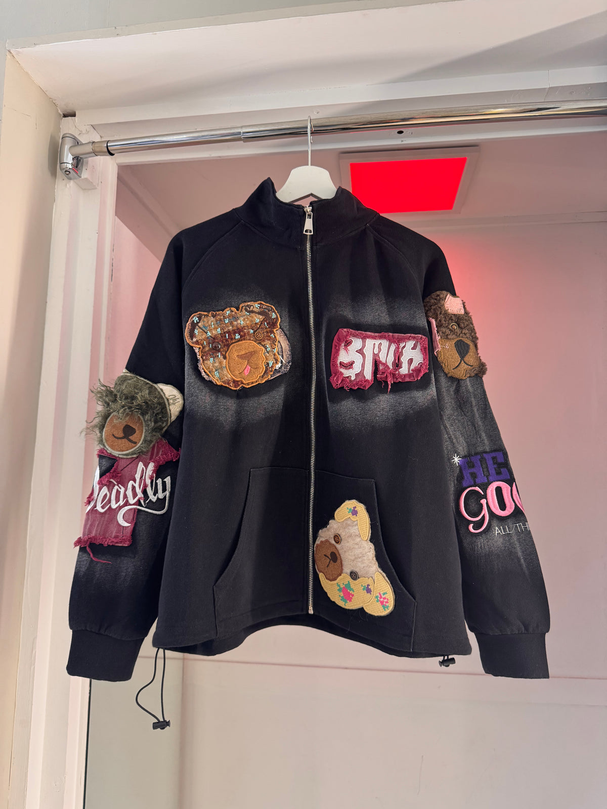 BLACK JACKET WITH BEAR