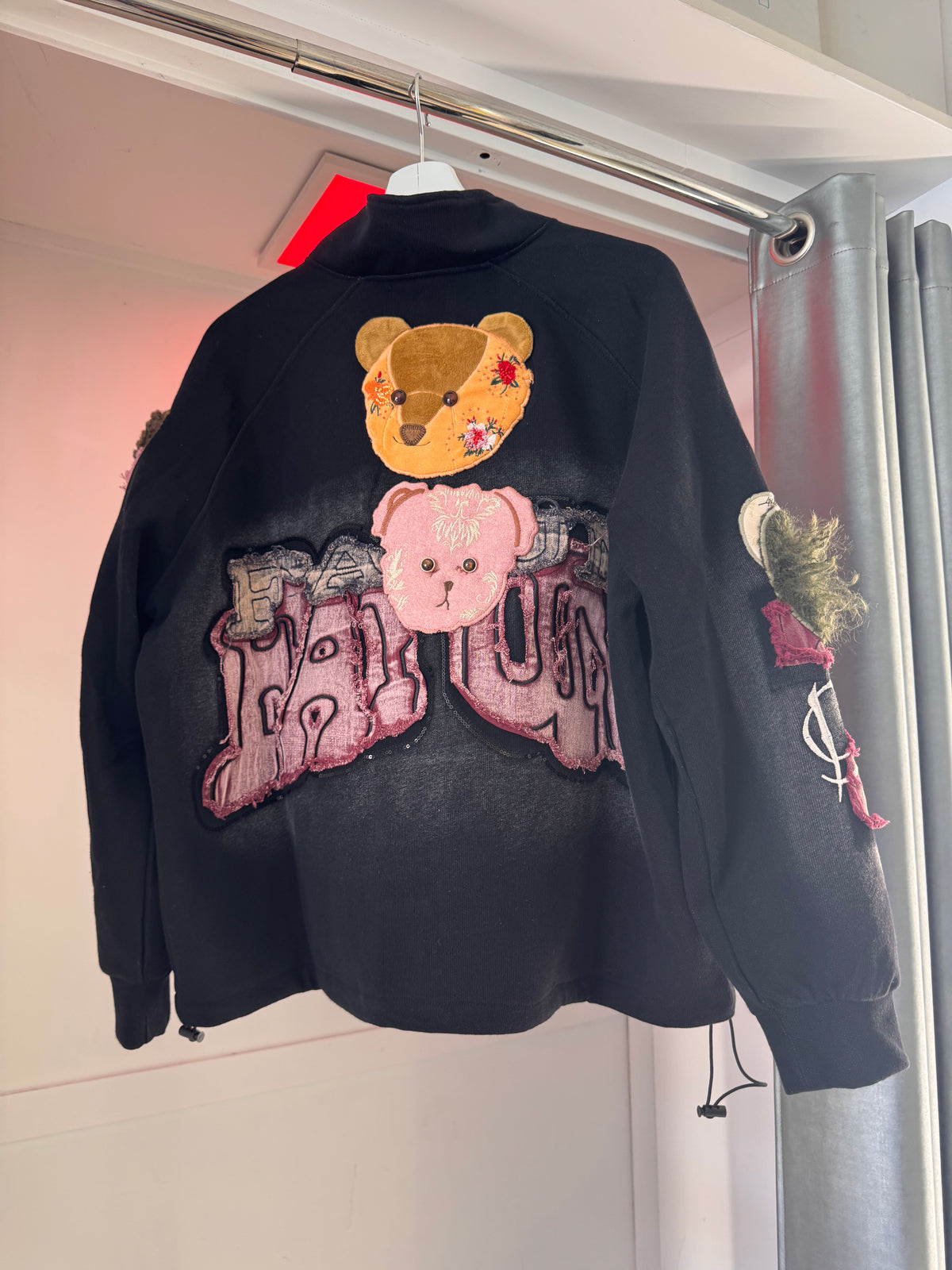 BLACK JACKET WITH BEAR