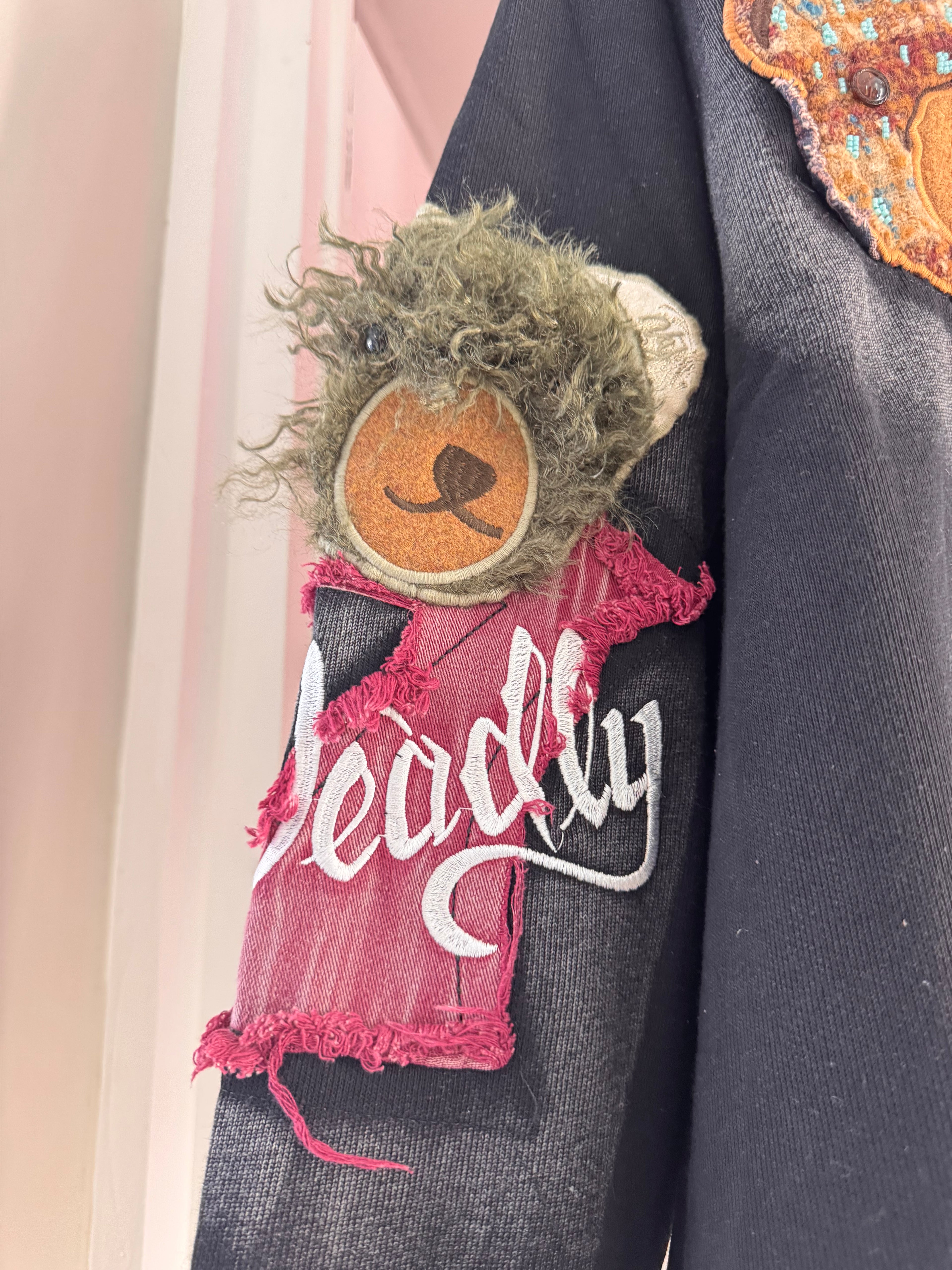 BLACK JACKET WITH BEAR